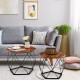 Set of 2 modern round coffee tables in rustic brown with pentagonal steel bases, perfect for living room use.